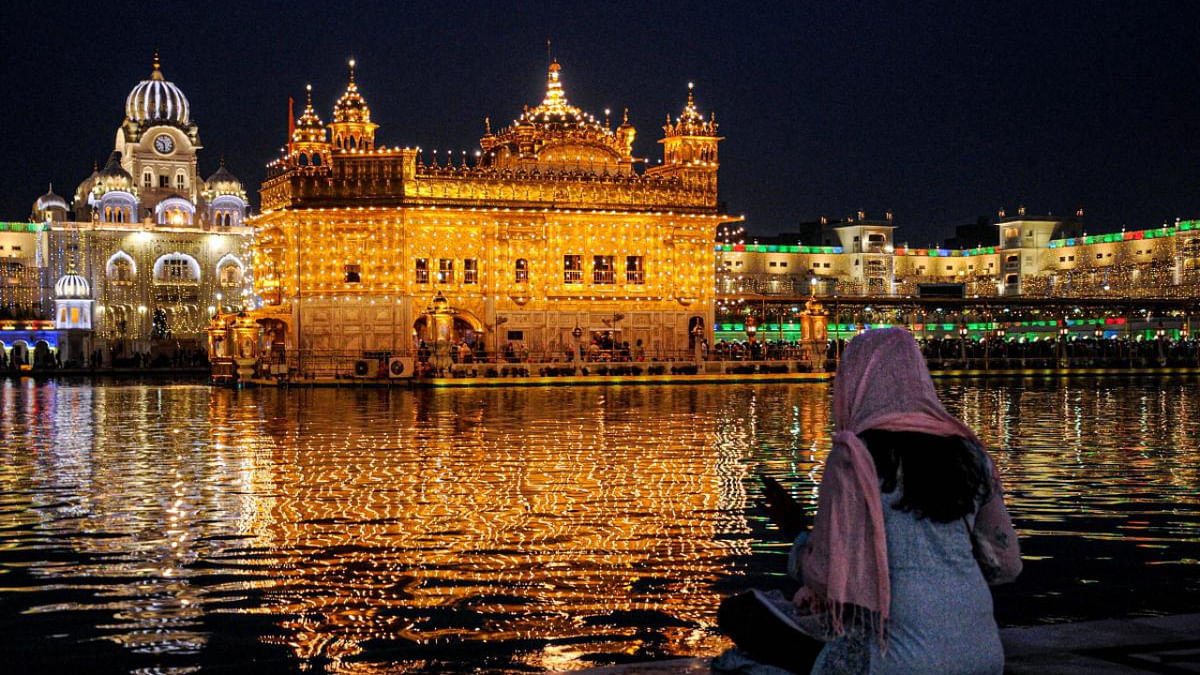 Woman with her cheek painted in tricolour 'stopped' from entering Golden Temple, controversy erupts