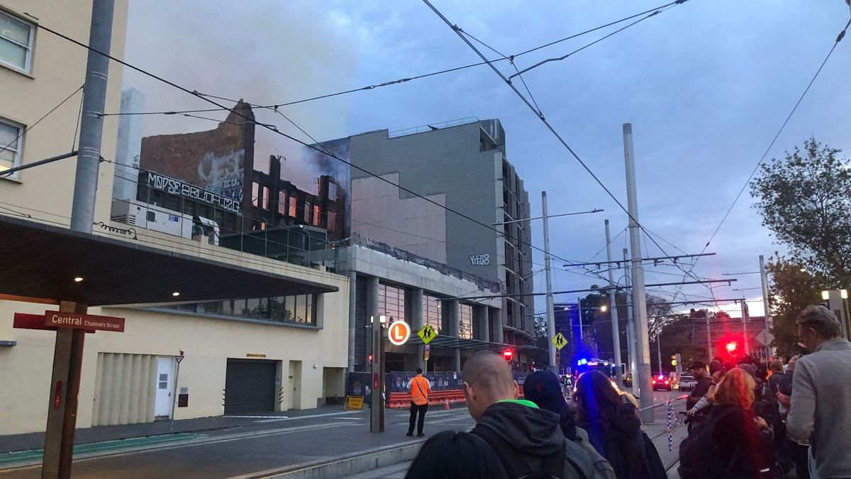 Over 100 firefighters battle seven-storey blaze in Sydney