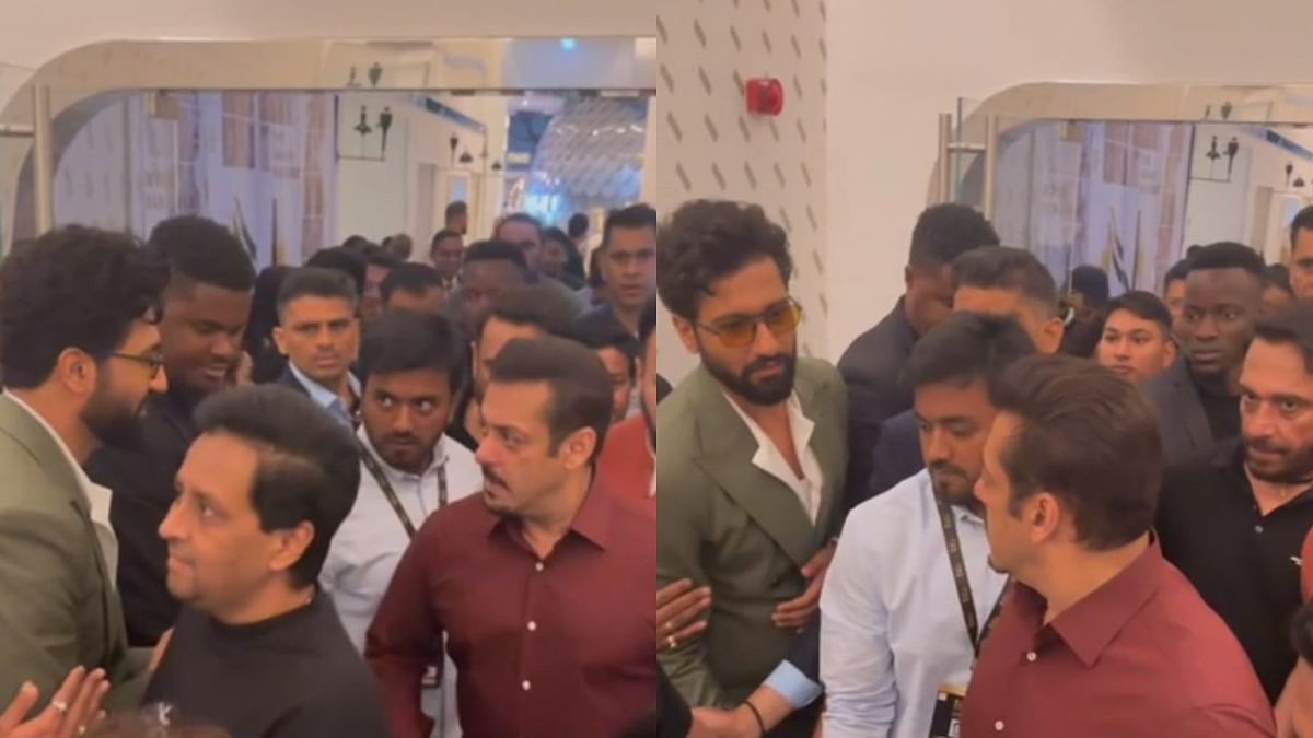 Vicky tries to talk to Salman, pushed aside by his security at a media event