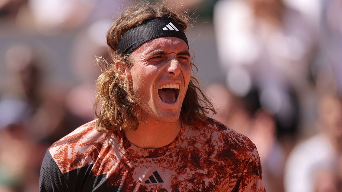 Tsitsipas survives scare to reach French Open second round