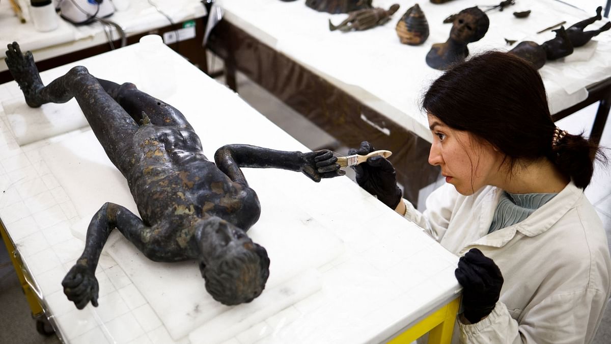 Village bin man helped unearth ancient bronze statues in Italy's Tuscany