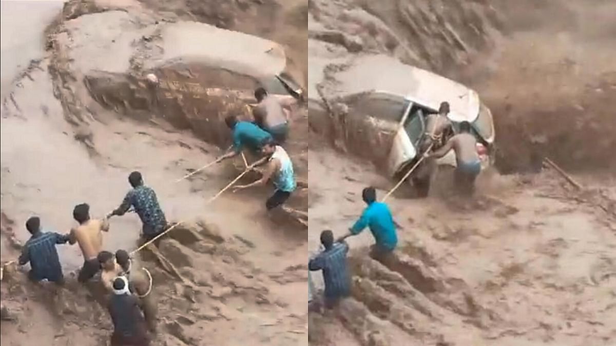 Car washes away in Haryana's Panchkula, woman rescued