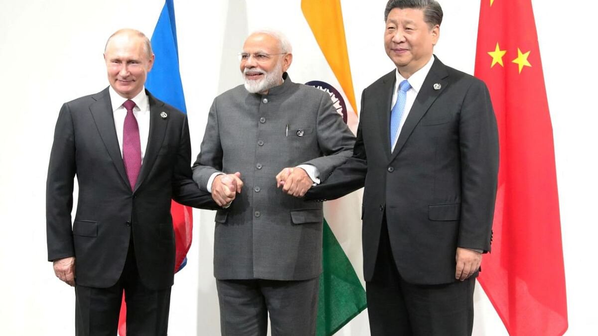Putin, Xi and Modi meet on camera, but with no signs of greater unity