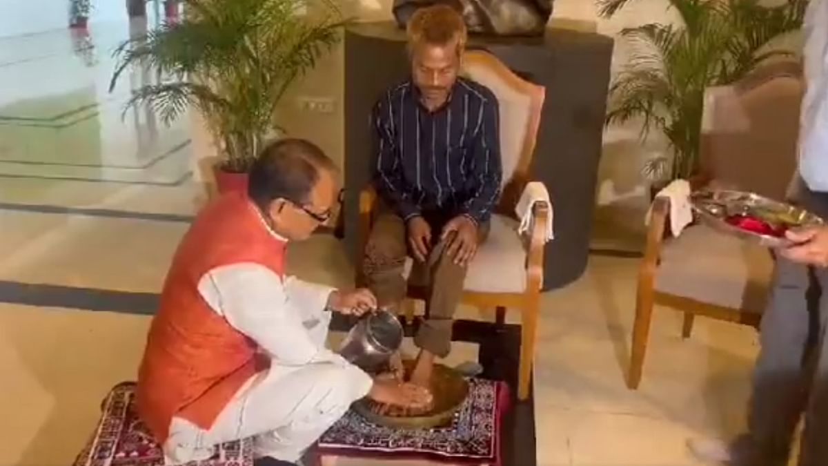 Madhya Pradesh CM Chouhan washes feet of urination incident victim, apologises to him