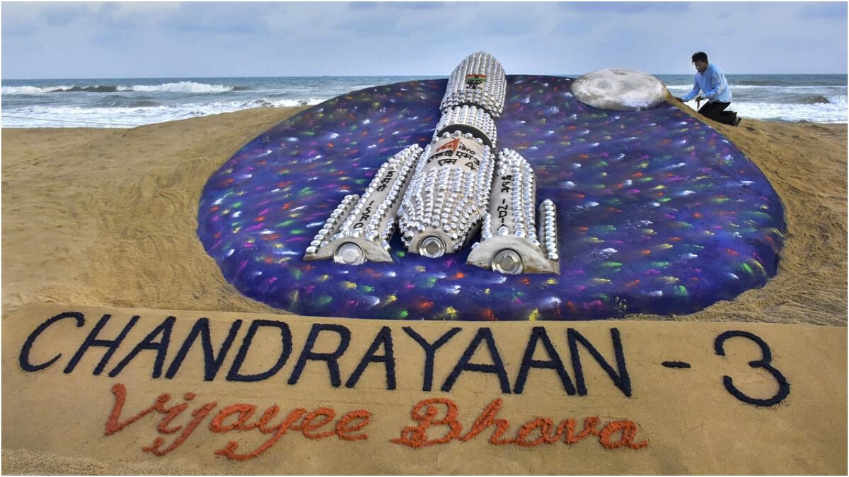 Puri: Artist Sudarsan Pattnaik creates a sand art to wish good luck to ISRO scientists ahead of ISRO's Chandrayaan-3 mission, in Puri, Thursday, July 13, 2023. 