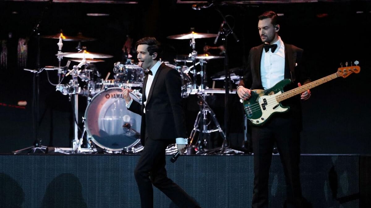 Malaysia halts music festival after same-sex kiss by UK band The 1975