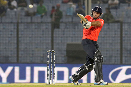 England's Michael Lumb bats during an ICC Twenty20 Cricket World Cup match against New Zealand in Chittagong, Saturday, March 22, 2014. AP Photo