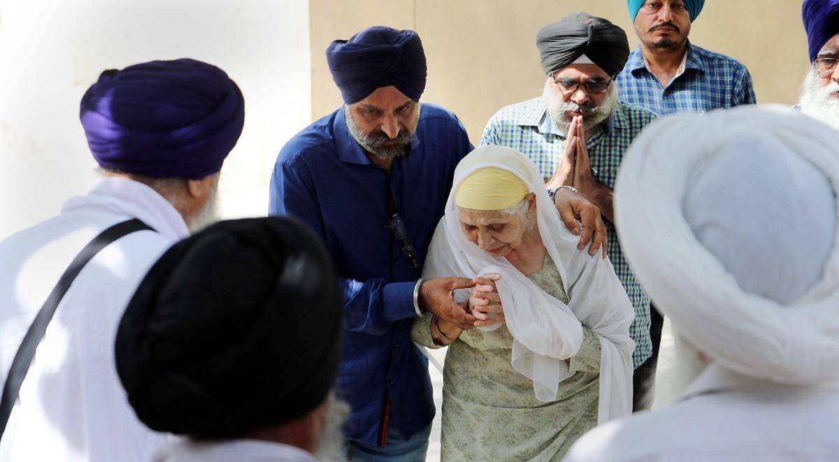 Family member of Khalistan Liberation Force Harminder Singh Mintoo arrive at the government Rajindra Hospital in Patiala on Thursday. Mintoo (51) was found lying unconscious in the Patiala Central Jail on Wednesday and was later declared brought dead at the hospital. PTI
