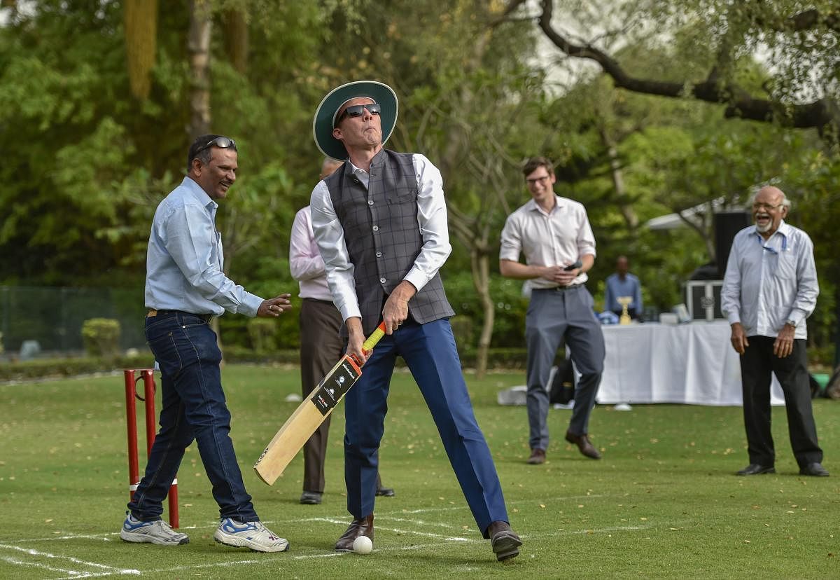 Australian Deputy High Commissioner to India Chris Elstoft plays a shot during a Blinds friendly Cricket match, in New Delhi, on Friday. PTI Photo