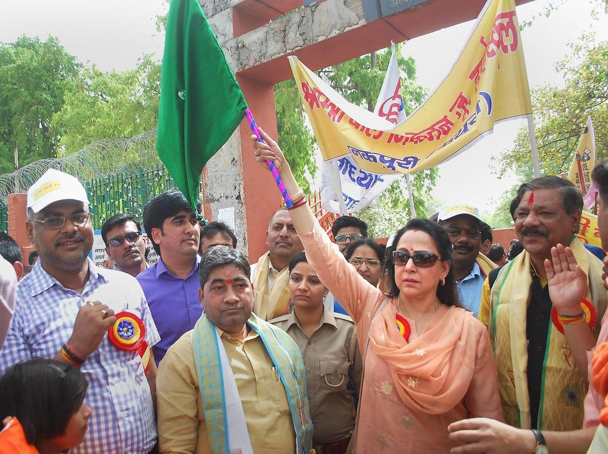 Bharatiya Janata Party MP Hema Malini flags off the 'School Chalo Abhiyaan' rally in Mathura on Saturday. PTI Photo