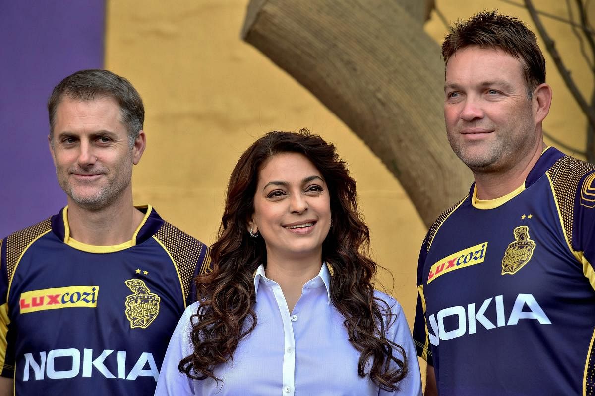 Kolkata Knight Riders (KKR) co-owner Juhi Chawla with Coach Jacques Kallis and Simon Katich during the unveiling of recycled waste installation at Eden Garden to observe World Earth day in Kolkata on Sunday. PTI Photo