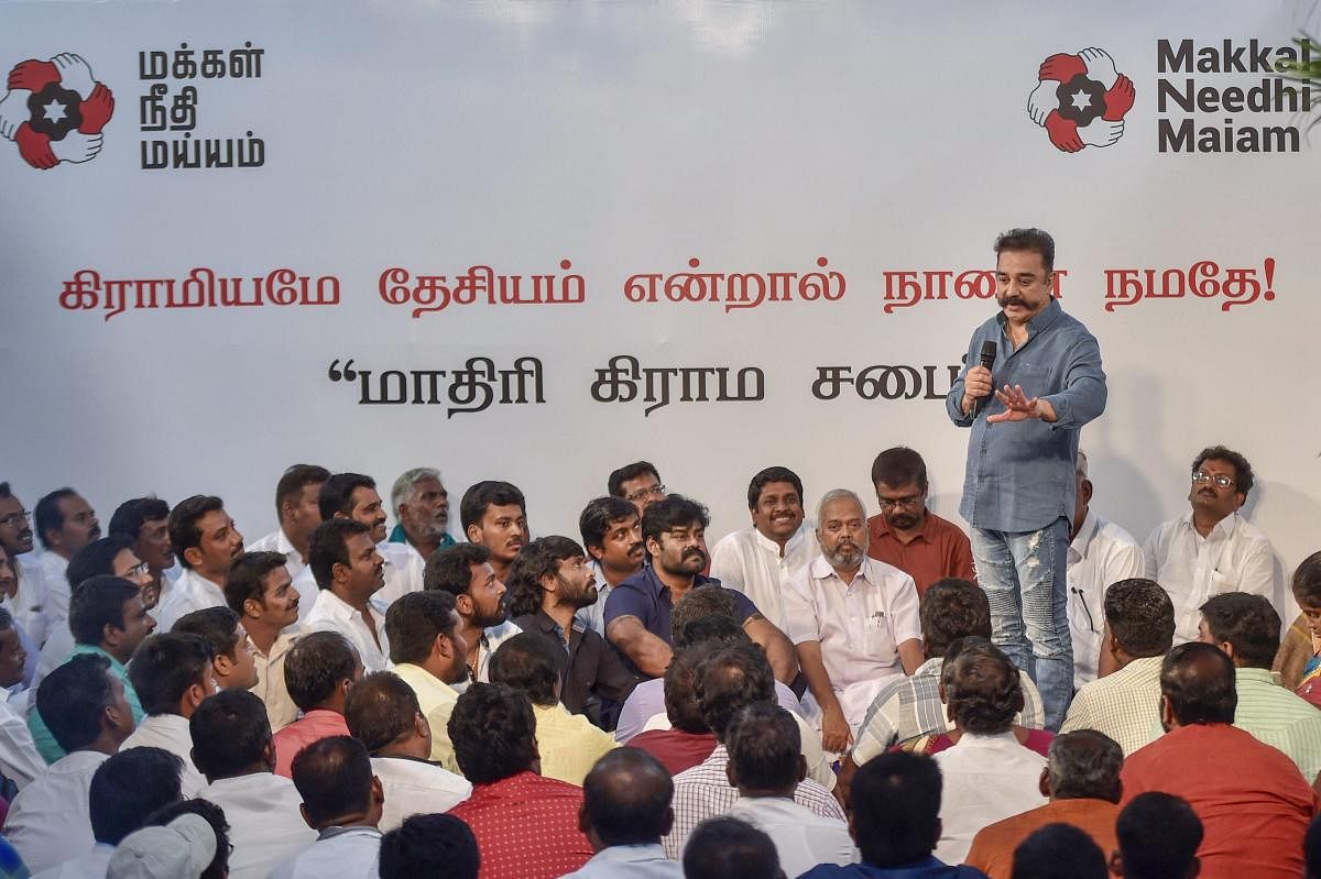 Makkal Needhi Maiam (MNM) president and actor Kamal Haasan at a mock 'gram sabha’ at the party headquarters in Chennai on Tuesday. PTI Photo