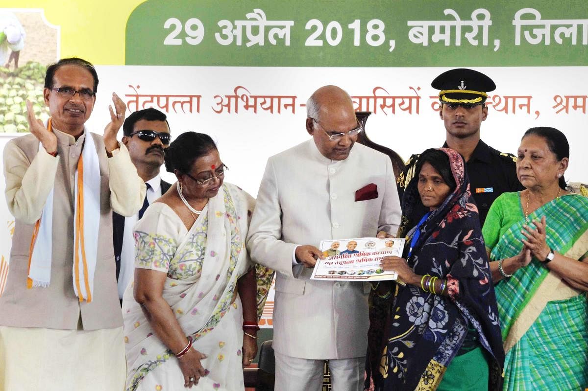 President Ram Nath Kovind during 'Asangathit Shramik Sammelan’ organised by the government of Madhya Pradesh in Guna on Sunday. PTI Photo