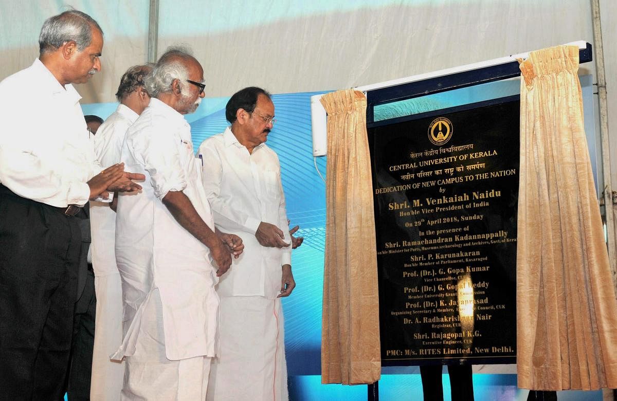 Vice-President M Venkaiah Naidu unveils the plaque to inaugurate the new campus of the Central University of Kerala, in Kasargod on Sunday. PTI Photo
