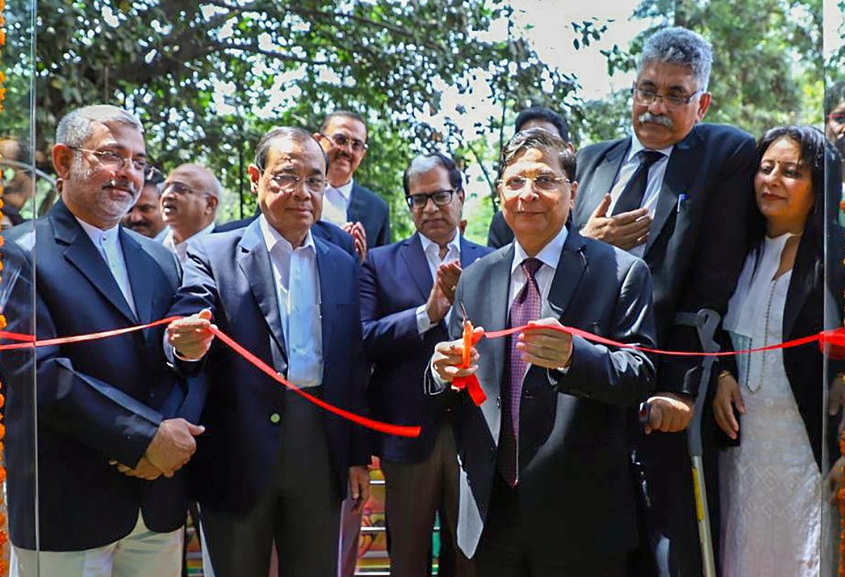 Chief Justice of India Dipak Misra inaugurates a creche facility at Supreme Court in New Delhi on Wednesday. PTI Photo