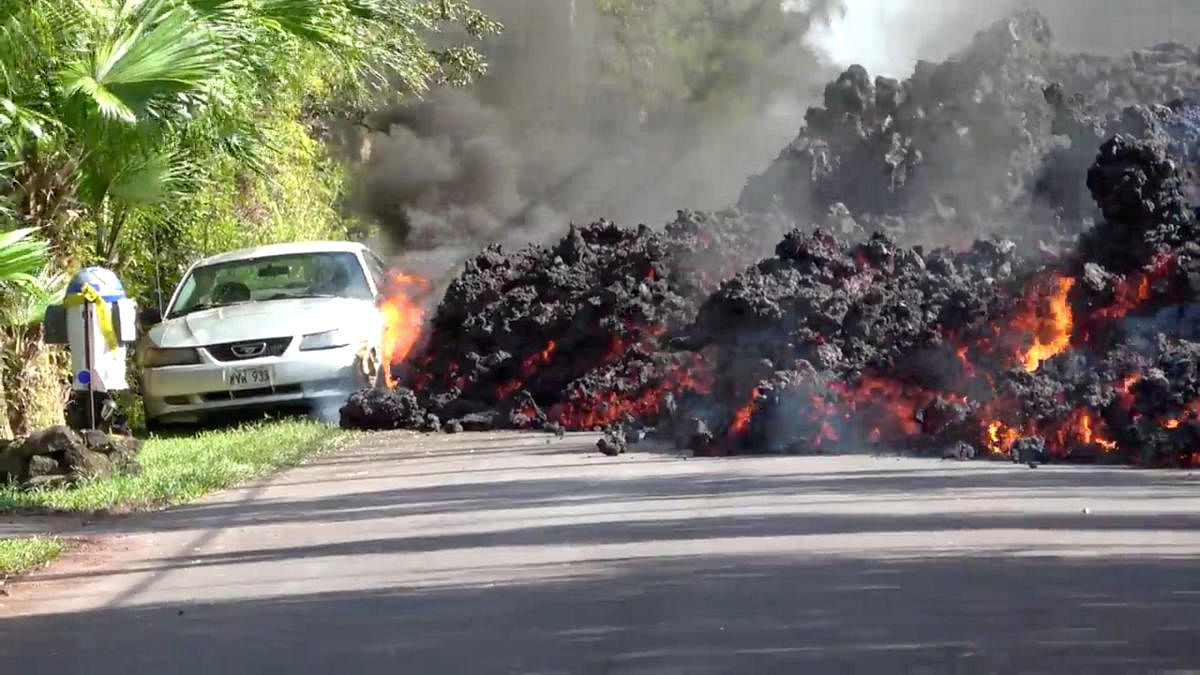 Lava engulfs a Ford Mustang in Puna, Hawaii, U.S. Reuters photo