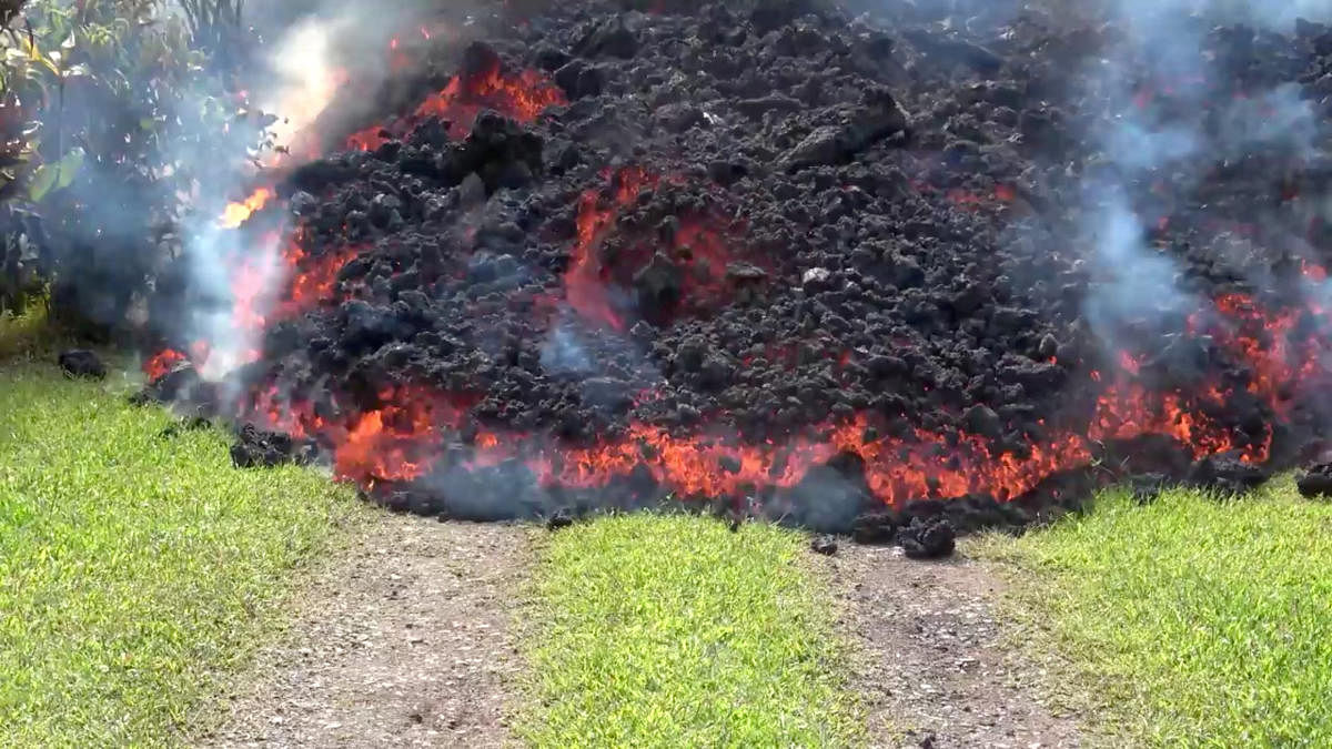 Advancing lava covers the grass in Puna, Hawaii, U.S. Reuters photo