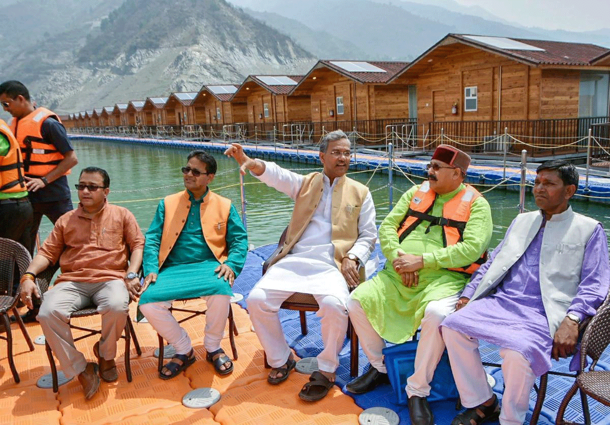 Chief Minister Trivendra Singh Rawat, along with his cabinet colleagues, inspects preparations for the Tehri Lake Festival 2018 in Tehri on Wednesday. PTI Photo