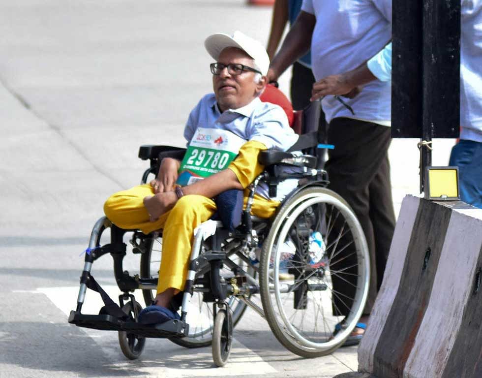 Physically challenged people participate  in the TCS world 10K run held at Shree Kanteerava Stadium in Bengaluru on Sunday.DH Photo