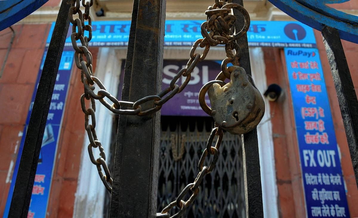 Amritsar: A closed branch of the State Bank of India (SBI) during the bank employees' two-day nationwide strike for wage revision, in Amritsar on Wednesday, May 30, 2018. (PTI Photo)