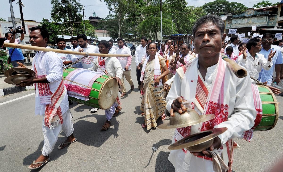 Guwahati: Former chief minister Prafulla Kumar Mahanta (C) along with Anup Chetia (2nd L), general secretary of United Liberation Front of Assam (ULFA) takes part in a protest rally against the Citizenship Amendment Bill, in Guwahati on Wednesday, May 30, 2018. (PTI Photo)