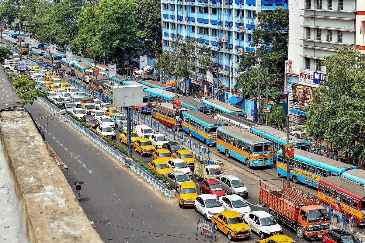 Kolkata: Vehicles stranded in a traffic jam as different trade union leaders and activists block the city road during a protest against fuel price hike, in Kolkata on Thursday, May 31, 2018. (PTI Photo/Swapan Mahapatra)