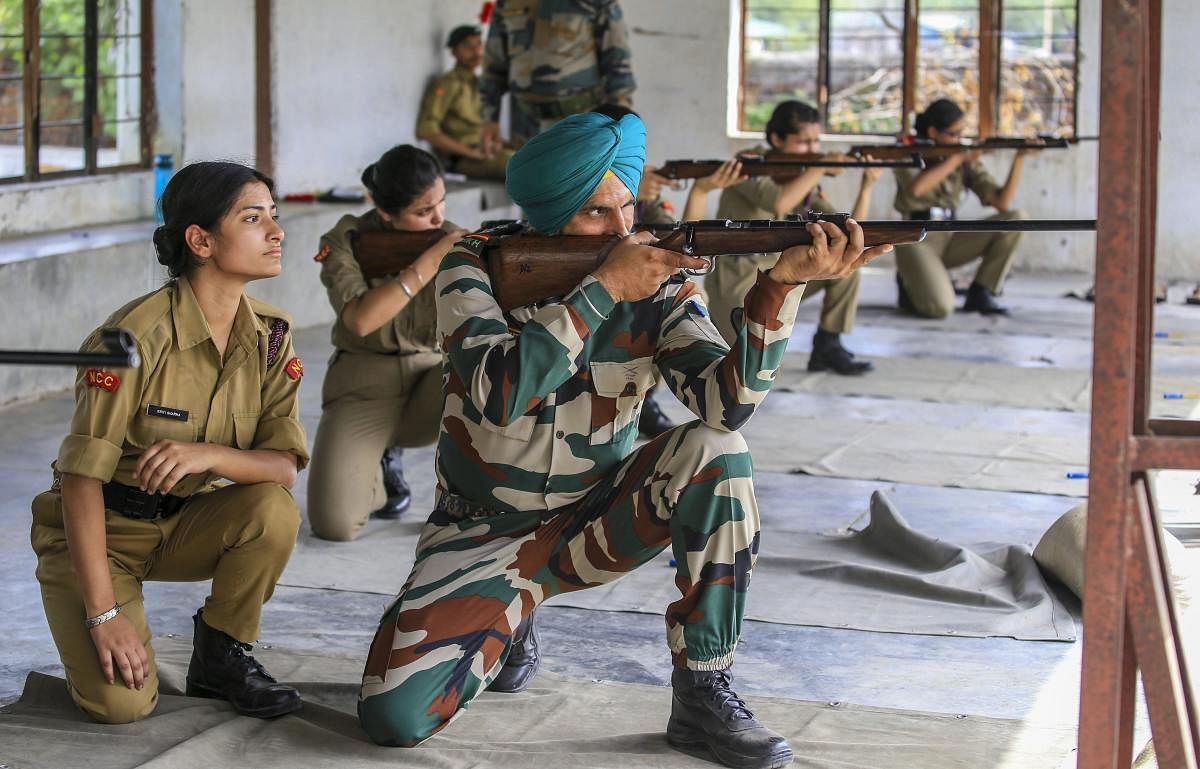 NCC cadets undergo a shooting training during Combined Army Training Camp at Nagrota on the outskirts of Jammu. PTI Photo