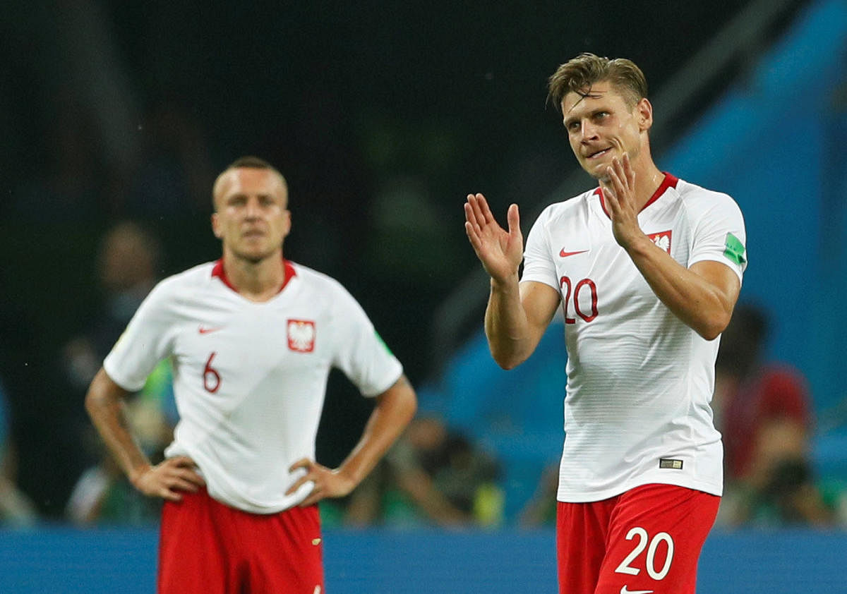 World Cup - Group H - Poland vs Colombia - Kazan Arena, Kazan, Russia - June 24, 2018 Poland's Lukasz Piszczek applauds their fans after the match. Reuters