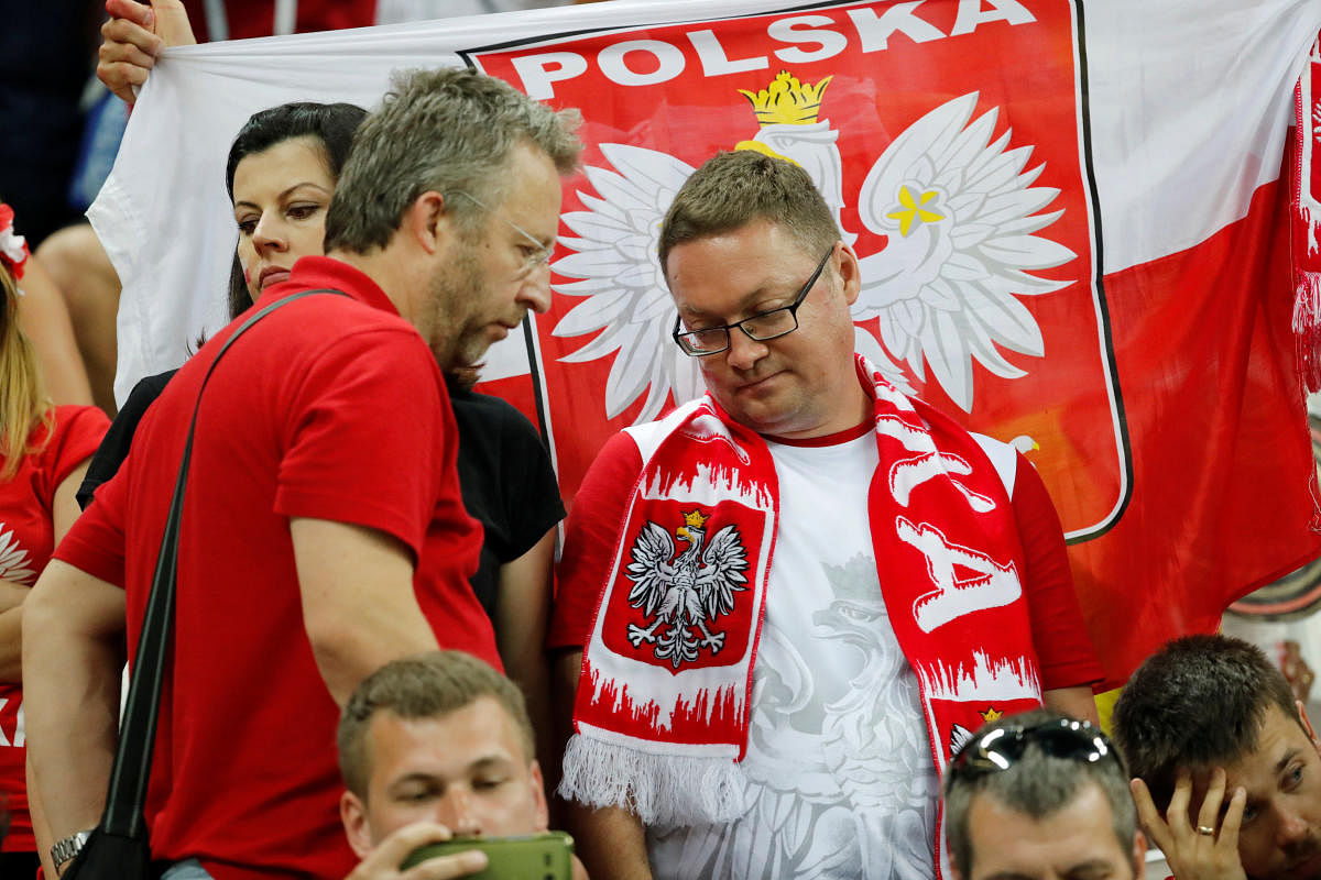 World Cup - Group H - Poland vs Colombia - Kazan Arena, Kazan, Russia - June 24, 2018 Poland fans look dejected at the end of the match. Reuters.