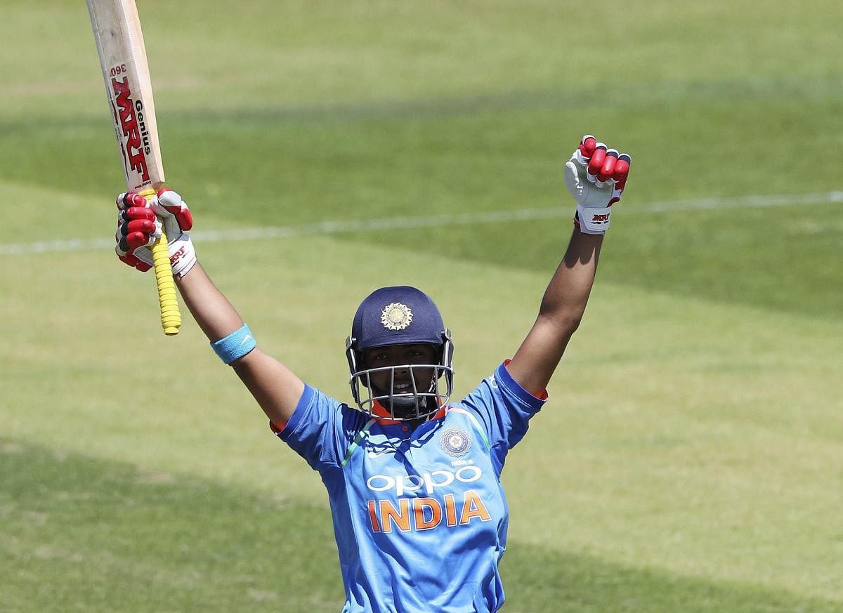 India A's Prithvi Shaw celebrates reaching a century, during a One Day tour cricket match between India A and the West Indies, at the County Ground, in Northampton, England, Friday June 29, 2018. (AP/PTI Photo)
