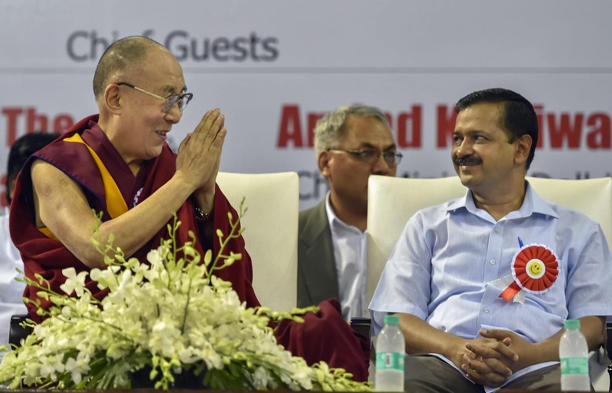 Delhi Chief Minister Arvind Kejriwal and spiritual leader Dalai Lama during the launch of Happiness Curriculum at Thyagaraj Sports Complex, in New Delhi, on Monday, July 02, 2018. (PTI Photo)