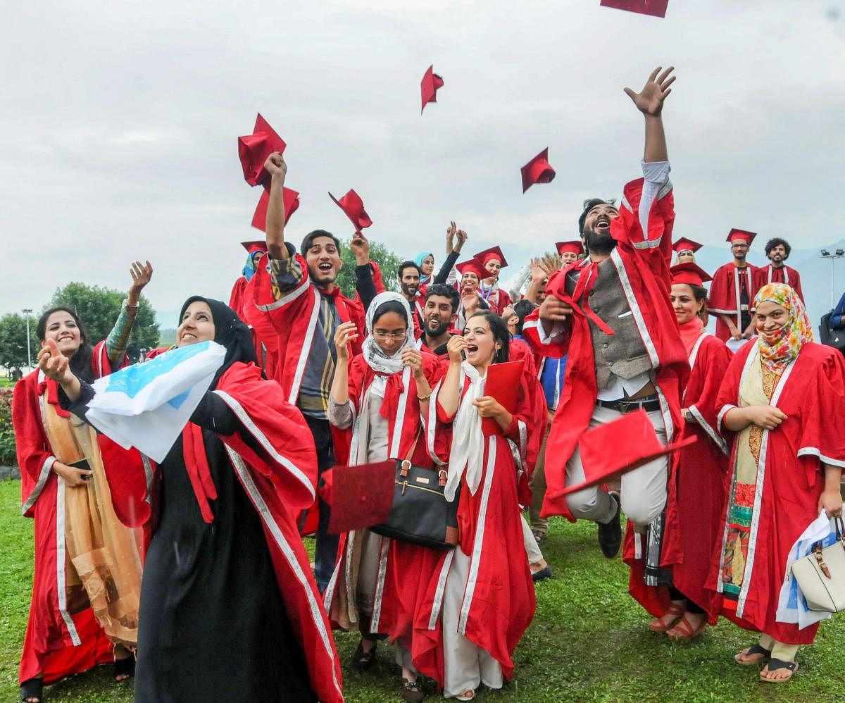 Students jubilate after receiving their awards during the 1st Convocation of Central University of Kashmir, in Srinagar on Wednesday, July 04, 2018. (PTI Photo)