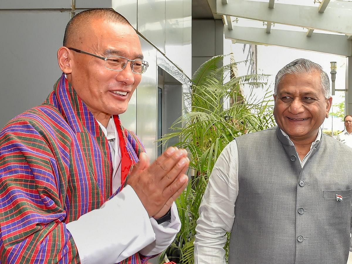 Bhutan Prime Minister Dasho Tshering Tobgay being welcomed by Minister of State for External Affairs V K Singh upon his arrival, in New Delhi on Thursday, July 05, 2018. (PTI Photo)