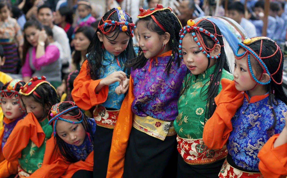 Exile Tibetan children in traditional costumes wait for their turn to perform at an event marking the 83rd birthday of Tibetan spiritual leader the Dalai Lama at the Tsuglakhang Temple in Dharmsala, India, Friday, July 6, 2018. Hundreds of Tibetans participated in the celebrations which included performances of traditional Tibetan opera and dances. AP/PTI Photo