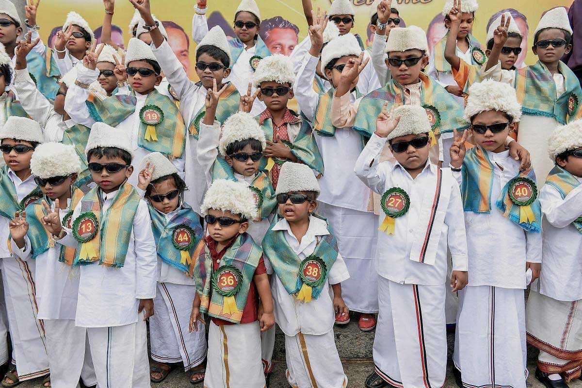 Kids dressed as former chief minister Marudur Gopalan Ramachandran (MGR) during his 101st birth year celebration, in Bengaluru on Sunday, July 07, 2018. PTI Photo