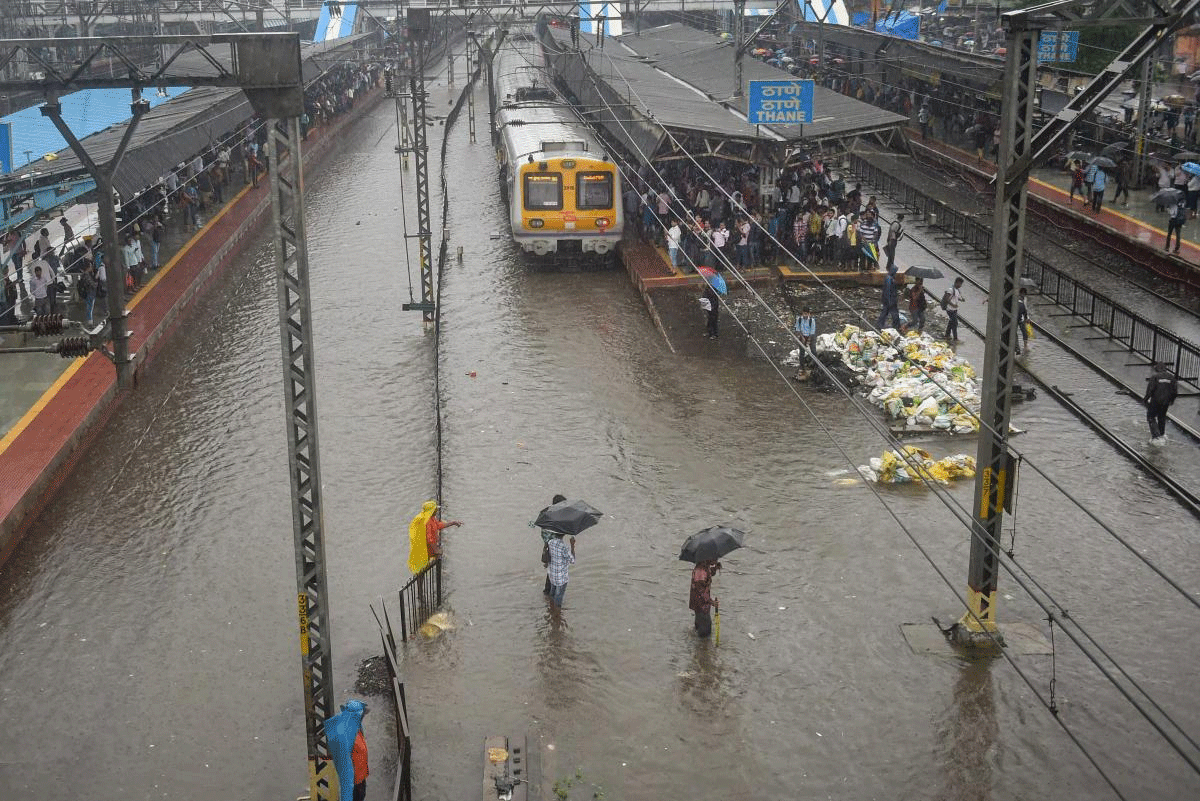 A view of the flooded Thane Railway Station during heavy rains, in Thane on Monday, July 9, 2018. PTI Photo