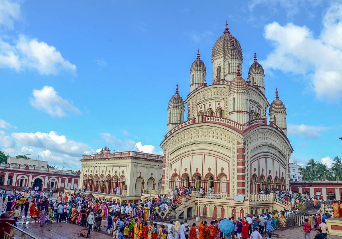 Devotees waits in a long queue at Dakshineswar Kali Temple on the occasion of 141st Rath yatra, in Kolkata on Saturday, July 14, 2018. (PTI Photo)