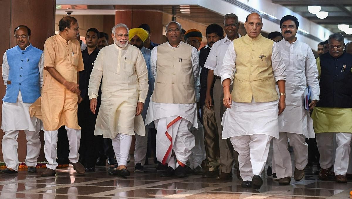 Prime Minister Narendra Modi with Union Home Minister Rajnath Singh, Parliamentary Affairs Minister Ananth Kumar, Congress party's Mallikarjun Kharge and other leaders after an all-party meeting ahead of the monsoon session of Parliament, in New Delhi on Tuesday, July 17, 2018. (PTI Photo/Atul Yadav)