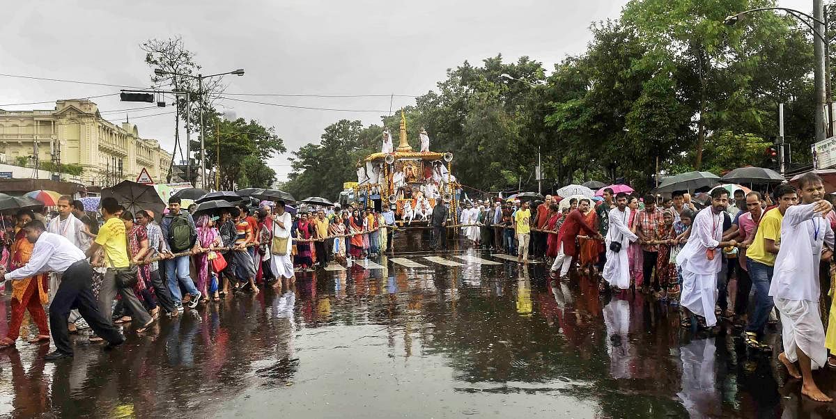 Devotees pull the chariot on the occasion of