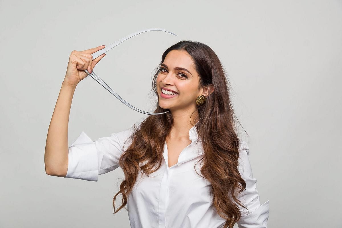 Deepika Padukone gives measurements for a wax statue to be displayed at Madame Tussauds, in Mumbai. (PTI Photo)