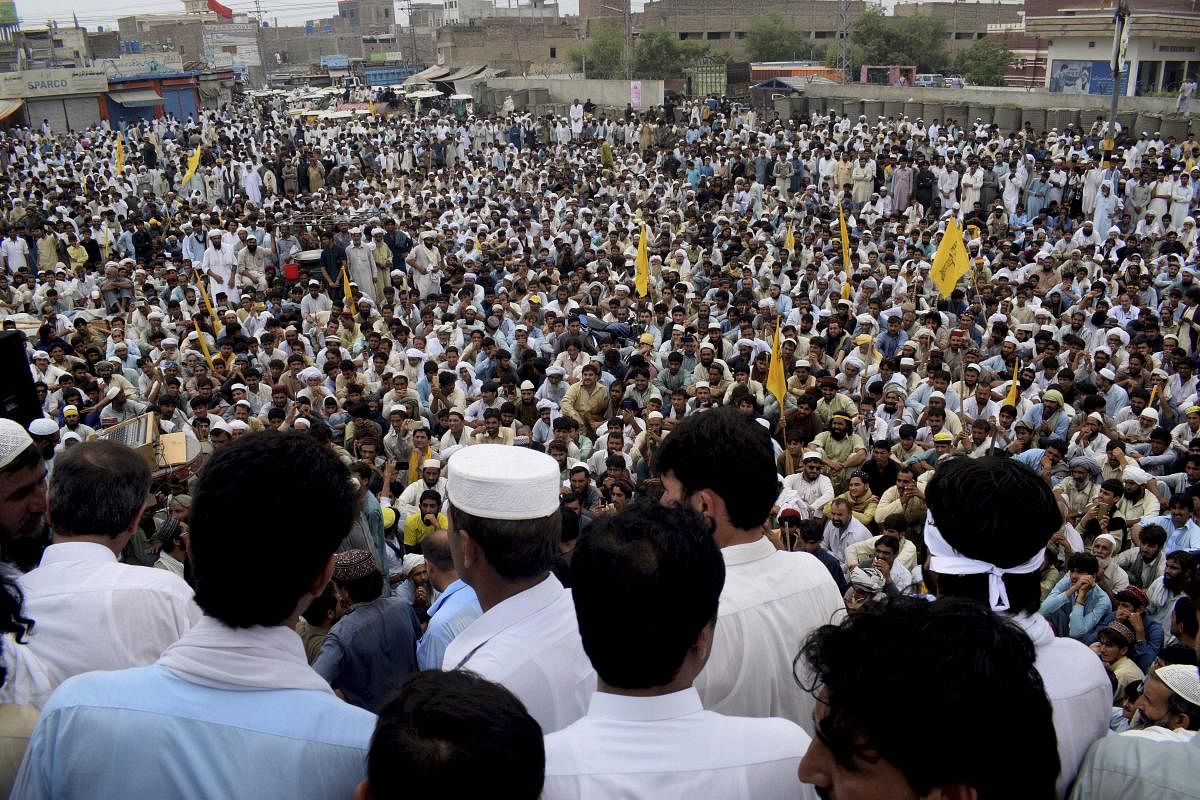 Bannu: Supporters of Pakistani independent political candidate who lost his seat, gathered to protest against Pakistan Election Commission demanding recounting of votes, in Bannu, Pakistan, Friday, July 27, 2018. A group that monitors elections has urged Pakistan's elections oversight body to address concerns of the country's political parties. AP/PTI