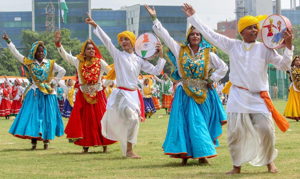 Students perform a folk dance to commemorate the 72nd Independence Day celebrations, in Gurugram on Wednesday, Aug 15, 2018. (PTI Photo)