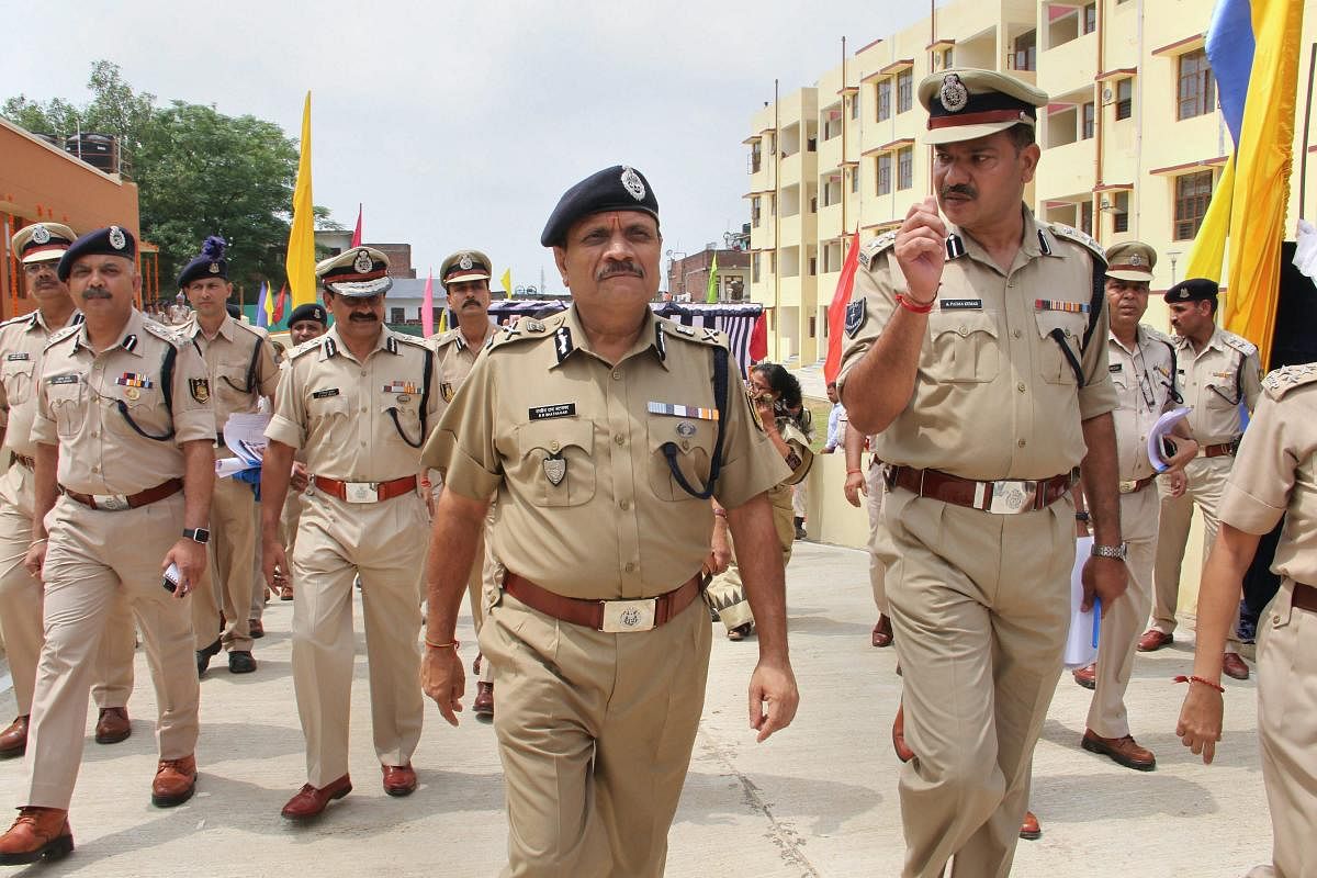 IPS Director General of CRPF RR Bhatnagar takes an inspection round during the inauguration of Jawan's Barracks and Residential Complex, in Jammu on Friday, Aug 24, 2018. PTI