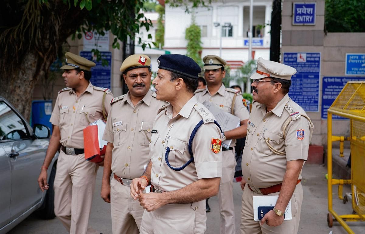 A Delhi Police team headed by Additional DCP (north) Harinder Singh at Patiala House Courts in conncection with Delhi Chief Secretary Anshu Prakash assault case, in New Delhi on Saturday, Au 25, 2018. PTI