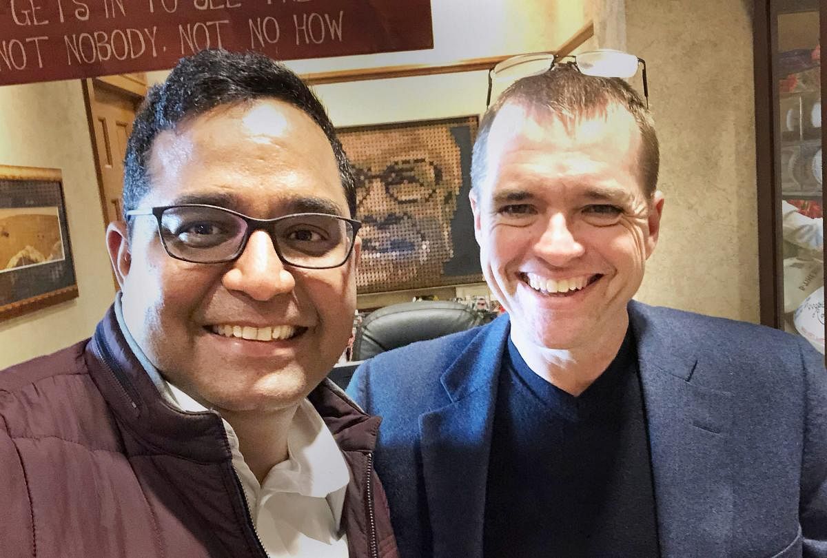 Berkshire Hathaway Investment Manager Todd Combs and Paytm founder and CEO Vijay Shekhar Sharma. Billionaire Warren Buffett's Berkshire Hathaway has picked up stake in Paytm and will get a position on the Board, the largest digital payments company in India said on Tuesday, Aug 28, 2018. PTI