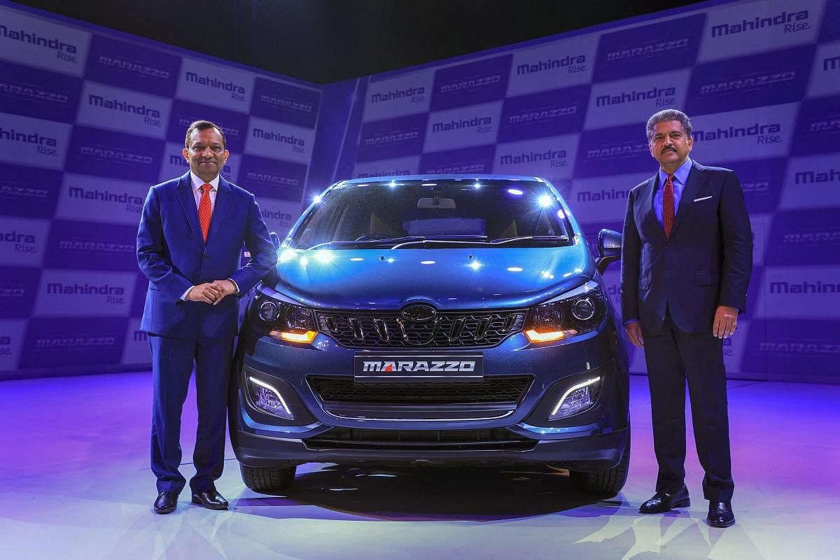 Mahindra & Mahindra Executive Chairperson Anand Mahindra with Managing Director Dr. Pawan Goenka during the launch of Mahindra Marazzo MPV, in Nashik on Monday, Sept 3, 2018. Home-grown auto major Mahindra & Mahindra (M&M) today launched its new utility passenger vehicle Marazzo at a starting price of Rs 9.99 lakh, which will compete with segment leader Toyota Innova Crysta. (PTI Photo)