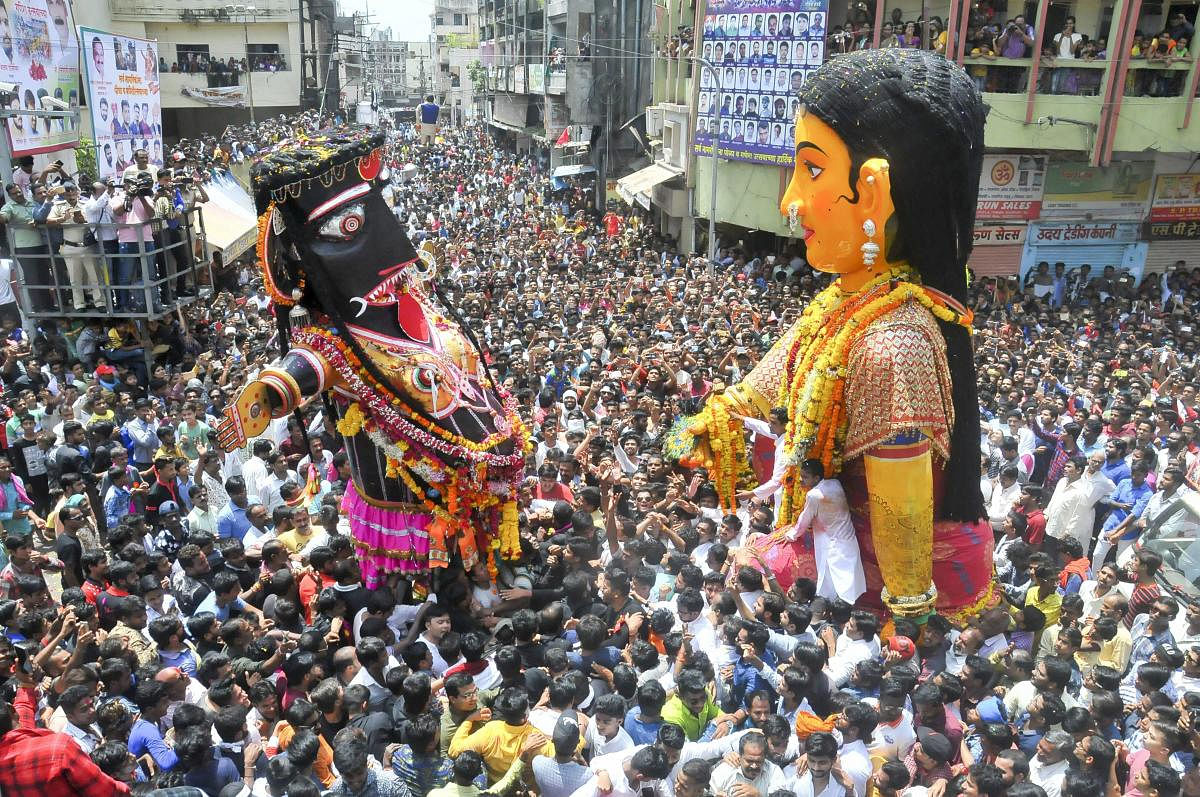 Devotees participate in the Peli and Kali Marbat procession as part of Pola festival celebrations, in Nagpur, Monday, Sep 10, 2018. (PTI Photo)