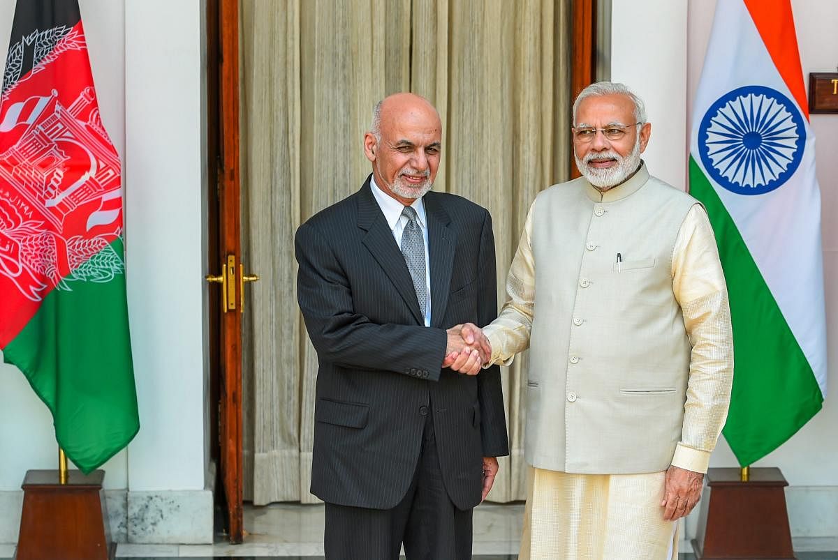 Prime Minister Narendra Modi (R) and Afghanistan President Ashraf Ghani ahead of a meeting at Hyderabad House, in New Delhi, Wednesday, Sep 19, 2018. (PTI Photo)