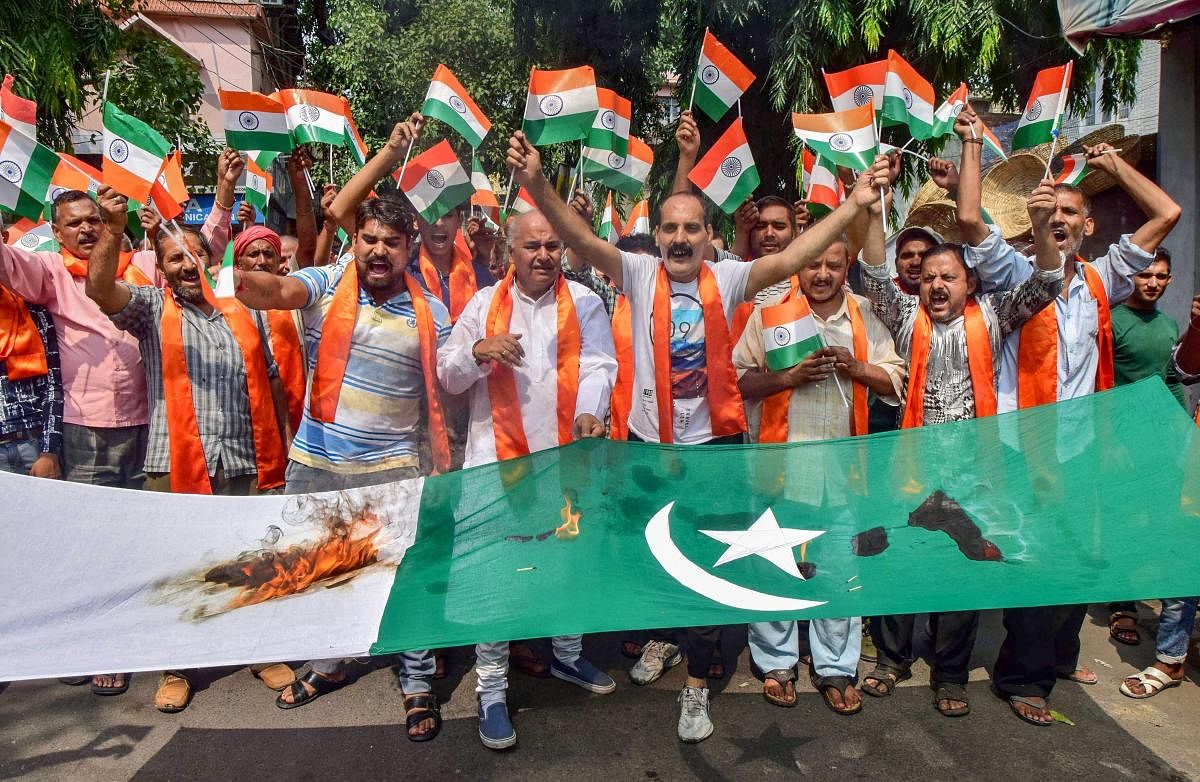 Jammu: Activists of Shiv Sena Dogra Front protest against Pakistan over the killing of SPOs by the militants, in Jammu, Friday, Sep 21, 2018. (PTI Photo)