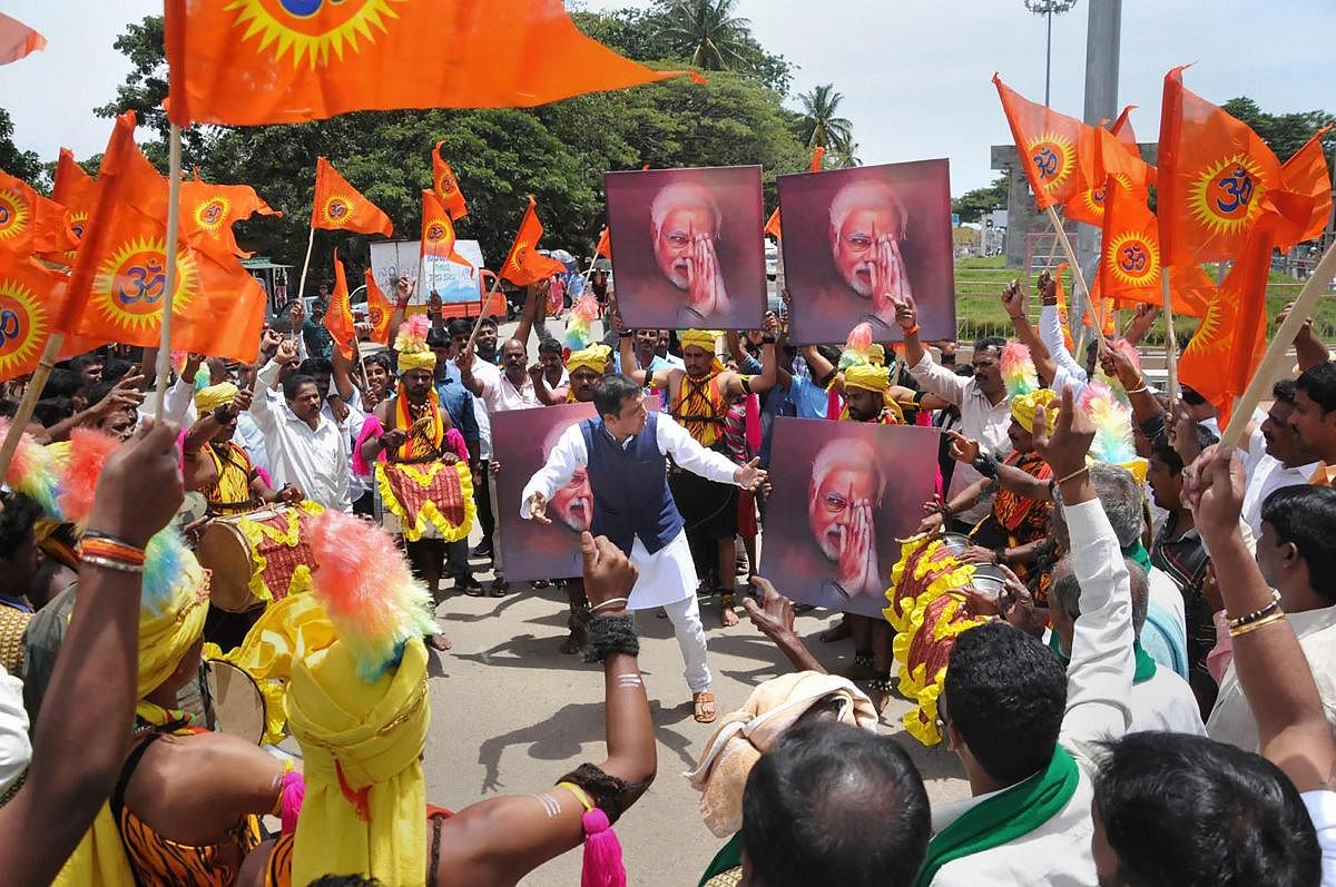 Chikmagalur: Artists perform during the shooting for a song of an album on prime minister Narendra Modi's achievements in the past four years, in Chikmagalur, Friday, Sep 21, 2018. (PTI Photo)